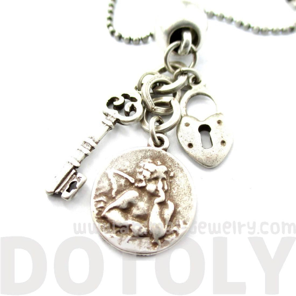 Romantic Themed Skeleton Key Heart Shaped Lock and Angel Coin Shaped Charm Necklace in Silver | DOTOLY