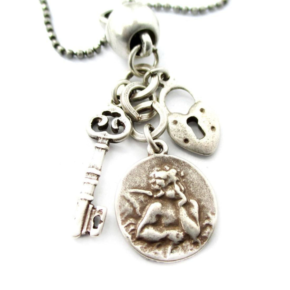 Romantic Themed Skeleton Key Heart Shaped Lock and Angel Coin Shaped Charm Necklace in Silver | DOTOLY