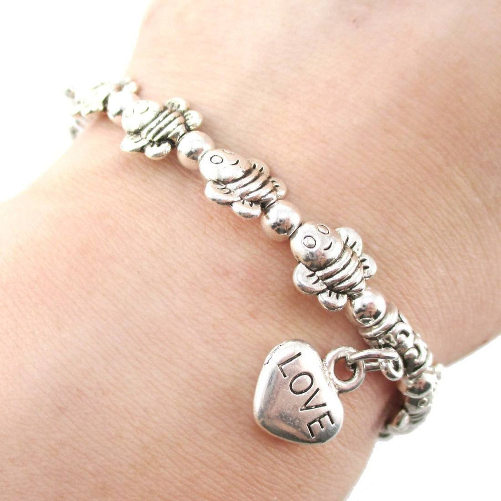 Row Of Bumble Bees Shaped Beaded Stretchy Bracelet in Silver | DOTOLY | DOTOLY