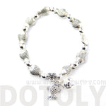 Row Of Fish Shaped Sea Animal Stretchy Bracelet in Silver | Animal Jewelry | DOTOLY