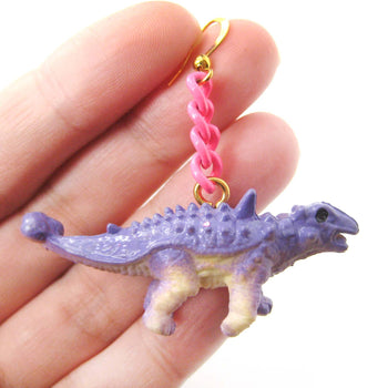 Scolosaurus Euoplocephalus Dinosaur Animal Figurine Shaped Dangle Earrings in Purple | DOTOLY