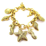 Sea Creatures Themed Charm Bracelet in Gold: Starfish Seahorse Seashell Dolphins | DOTOLY