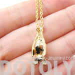 Sleek Abstract Bat Shaped Animal Pendant Necklace in Gold | DOTOLY | DOTOLY