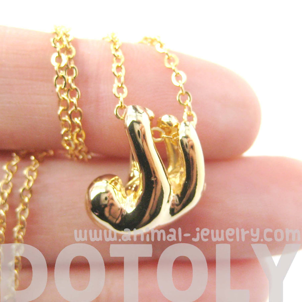Sleek Abstract Sloth Shaped Animal Pendant Necklace in Gold | DOTOLY | DOTOLY