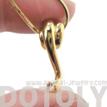 Sleek Abstract Snake Shaped Animal Pendant Necklace in Gold | DOTOLY | DOTOLY