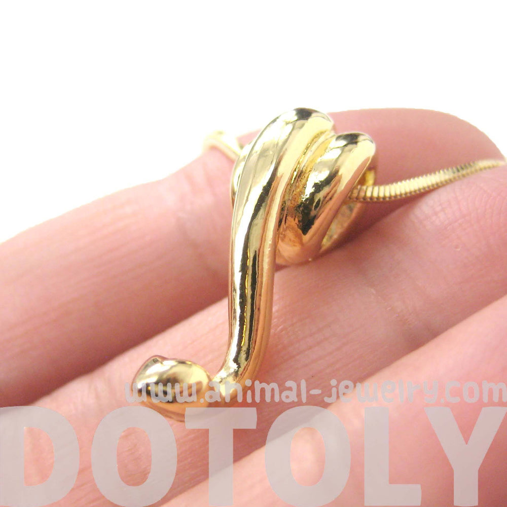 Sleek Abstract Snake Shaped Animal Pendant Necklace in Gold | DOTOLY | DOTOLY