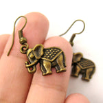 Small Elephant Shaped Dangle Earrings in Brass with Textured Detail | DOTOLY | DOTOLY