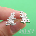 Small Godzilla Shaped Dinosaur Stud Earrings in Silver | DOTOLY