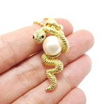 Snake Wrapped Around a Pearl Shaped Animal Pendant Necklace in Gold | DOTOLY