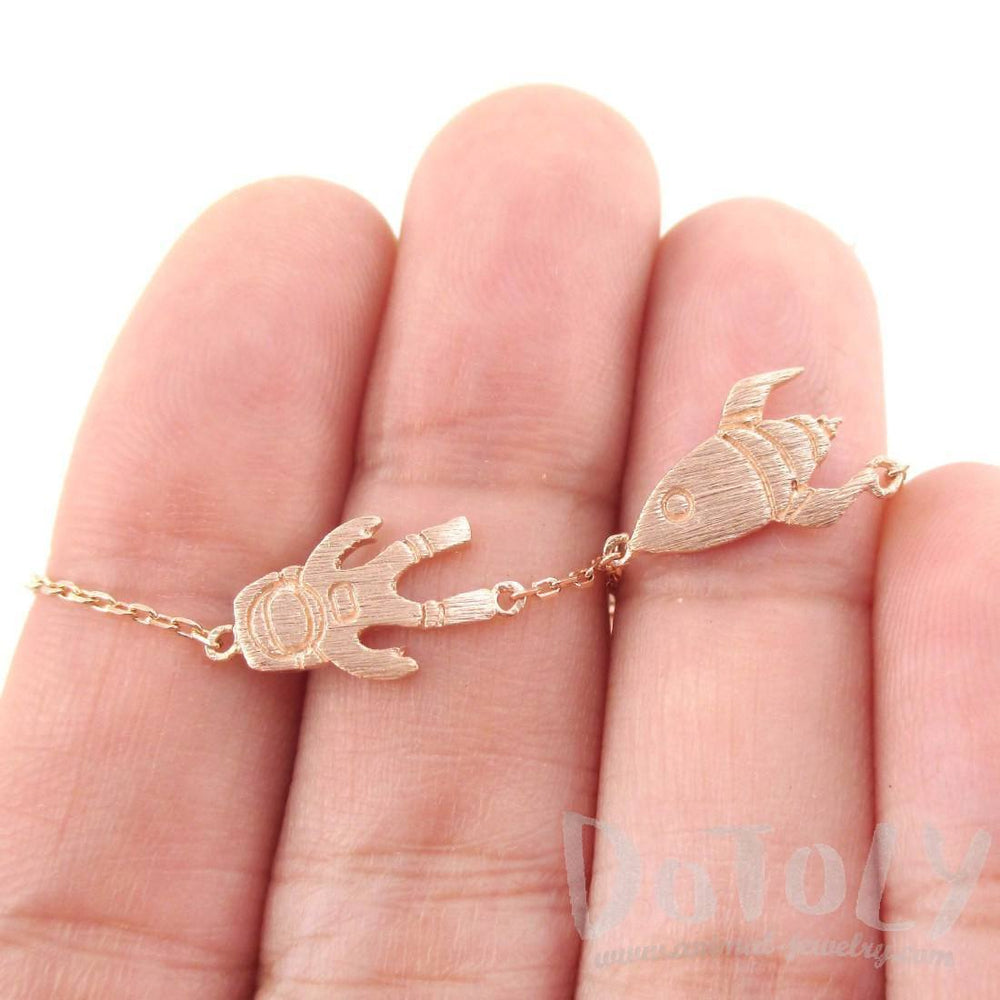 Spaceship and Astronaut Space Travel Themed Charm Necklace in Rose Gold | DOTOLY | DOTOLY