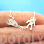 Spaceship and Astronaut Space Travel Themed Charm Necklace in Silver | DOTOLY | DOTOLY