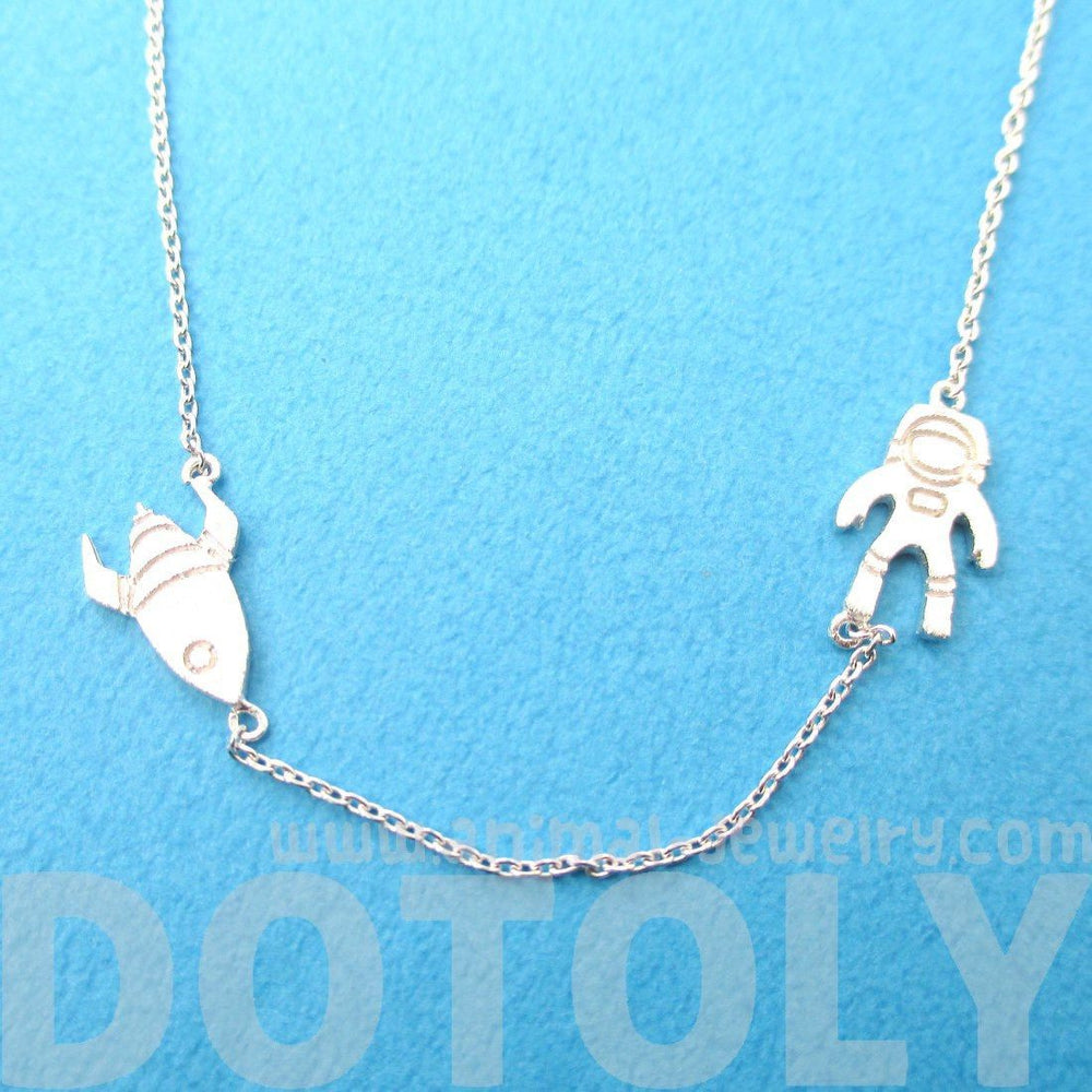 Spaceship and Astronaut Space Travel Themed Charm Necklace in Silver | DOTOLY | DOTOLY