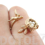 Sparrow and Bird Nest on A Branch Wrap Around Adjustable Ring in Antique Gold | DOTOLY
