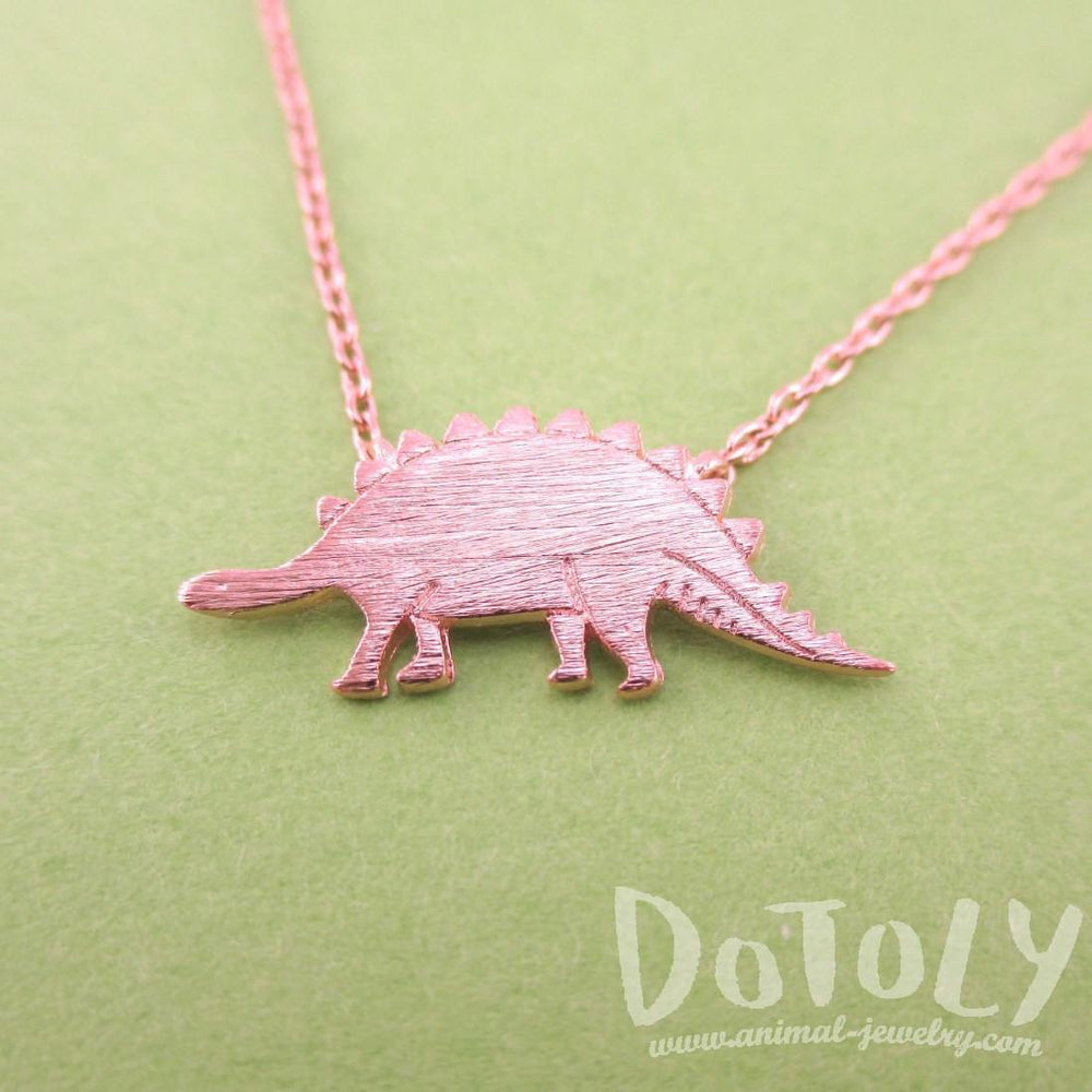 Stegosaurus Dinosaur Silhouette Jurassic World Themed Charm Necklace in Rose Gold | DOTOLY