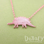 Stegosaurus Dinosaur Silhouette Jurassic World Themed Charm Necklace in Rose Gold | DOTOLY