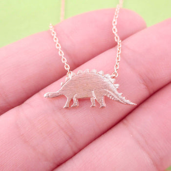 Stegosaurus Dinosaur Silhouette Jurassic World Themed Charm Necklace in Rose Gold | DOTOLY