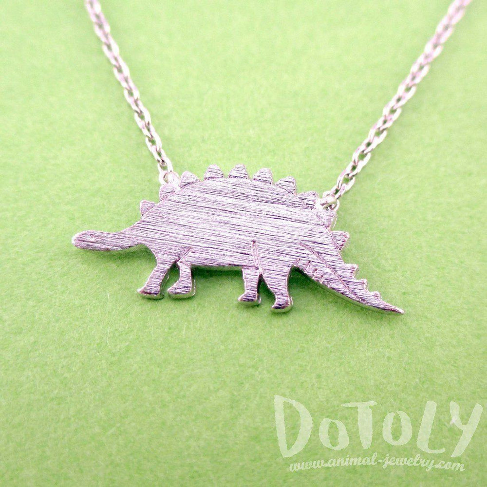 Stegosaurus Dinosaur Silhouette Jurassic World Themed Charm Necklace in Silver | DOTOLY