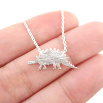 Stegosaurus Dinosaur Silhouette Jurassic World Themed Charm Necklace in Silver | DOTOLY