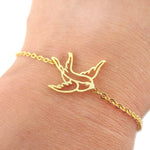 Swallow Bird Outline Shaped Charm Bracelet in Gold | Animal Jewelry | DOTOLY