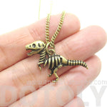 T Rex Dinosaur Skeleton Fossil Animal Bones Pendant Necklace in Brass | DOTOLY