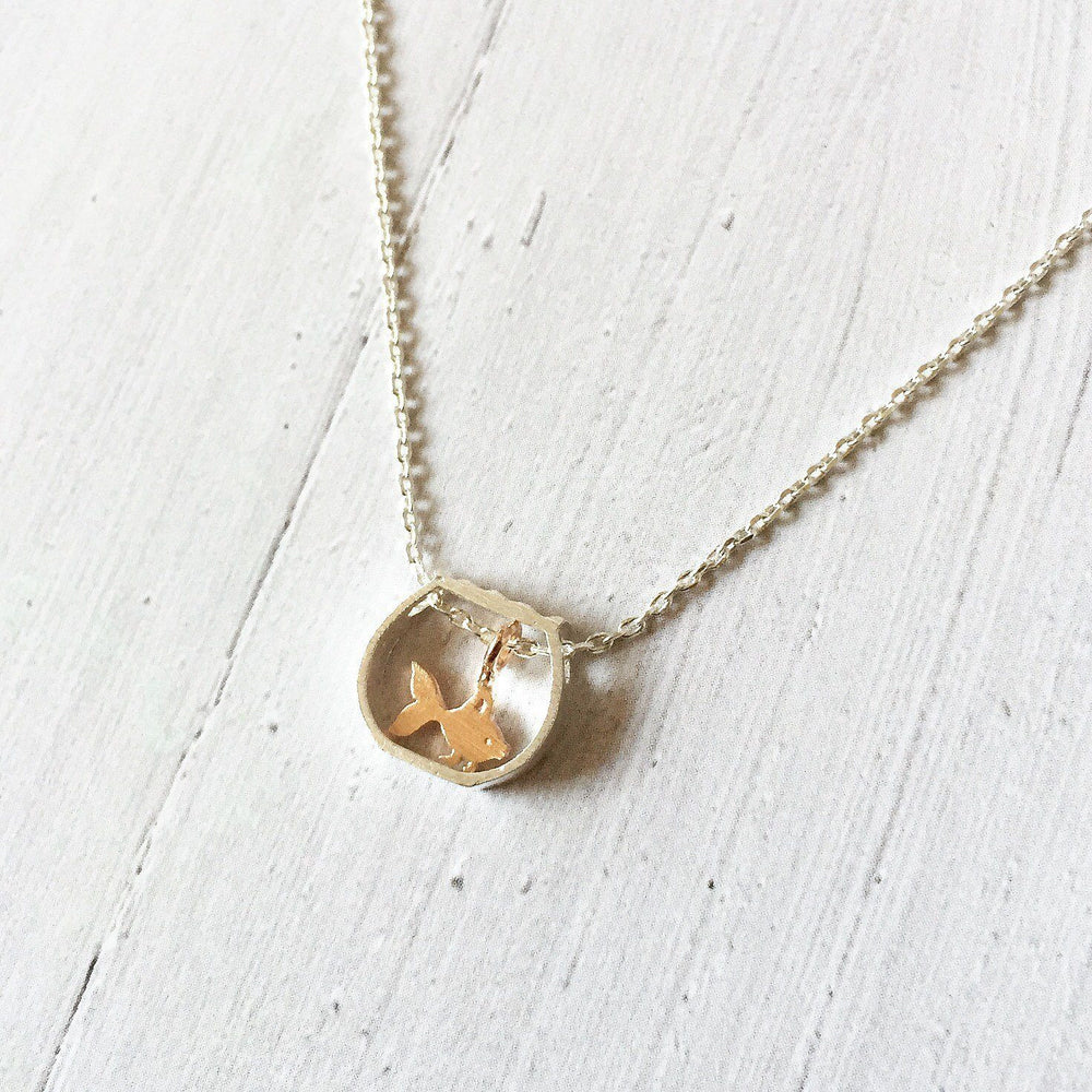 Tiny Goldfish in a Fish Bowl Shaped Pendant Necklace in Silver | DOTOLY | DOTOLY