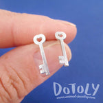 Tiny Skeleton Key Shaped Allergy Free Stud Earrings in Silver | DOTOLY
