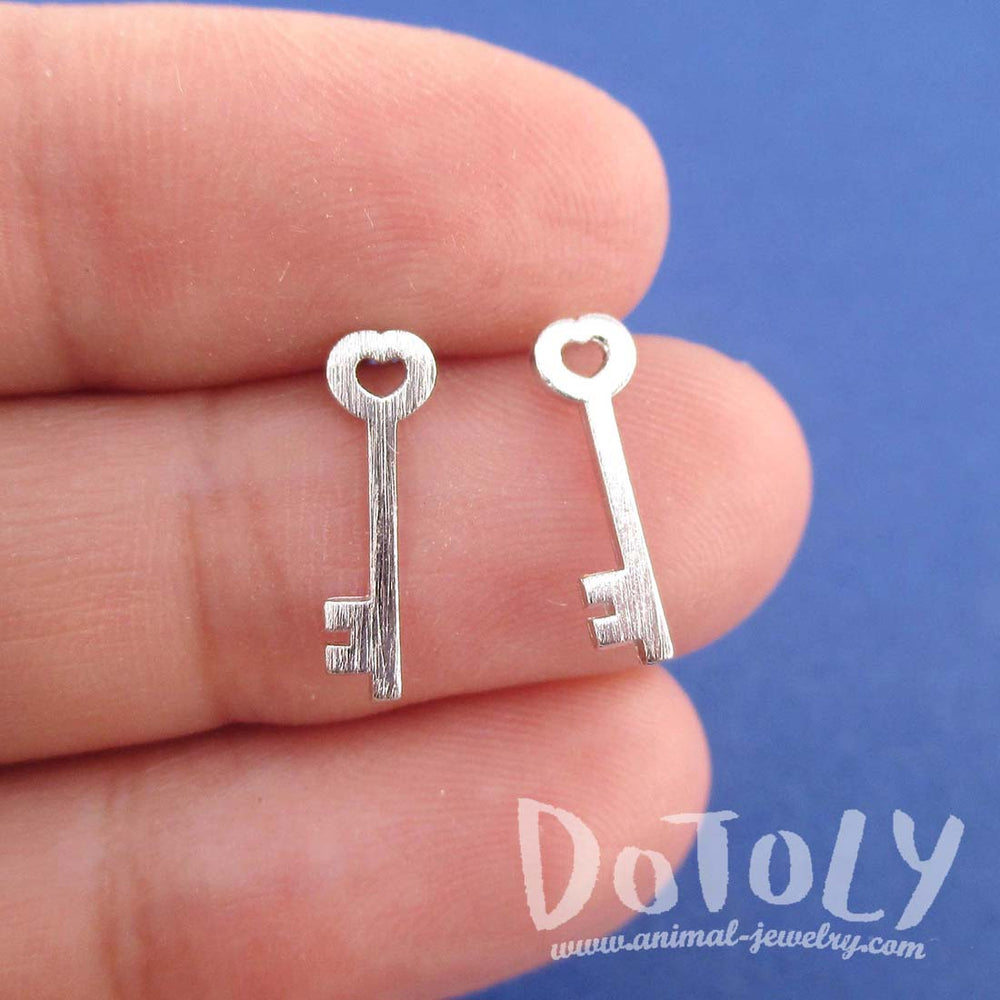 Tiny Skeleton Key Shaped Allergy Free Stud Earrings in Silver | DOTOLY