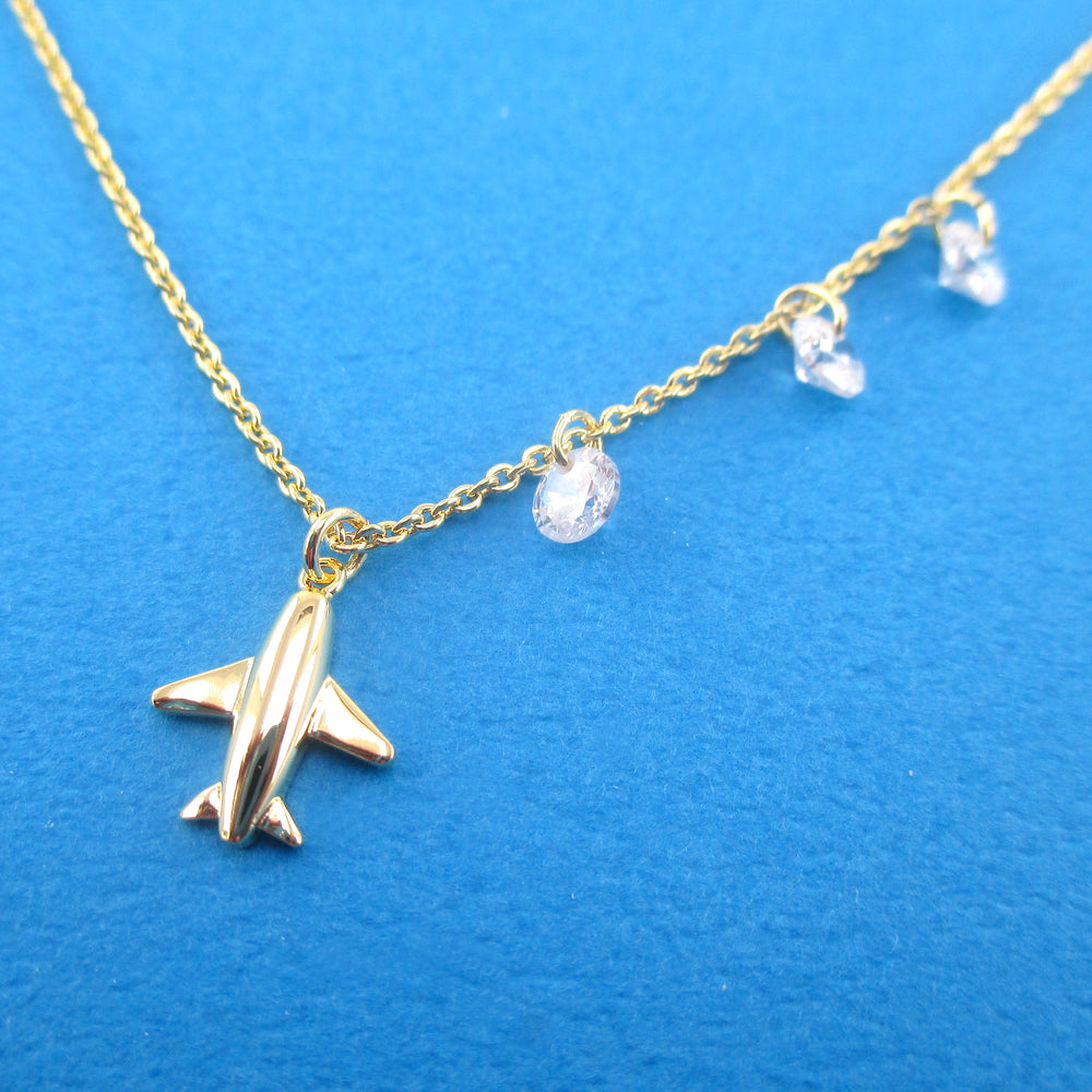 Travel Inspired Airplane Shaped Rhinestone Charm Necklace in Gold