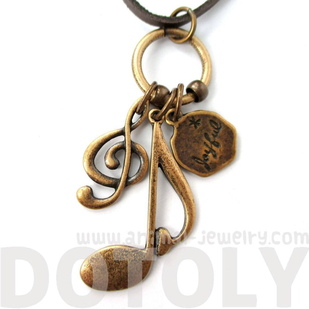 Treble Clef Musical Quaver Note and Dove Shaped Charm Necklace in Brass | DOTOLY