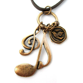 Treble Clef Musical Quaver Note and Dove Shaped Charm Necklace in Brass | DOTOLY