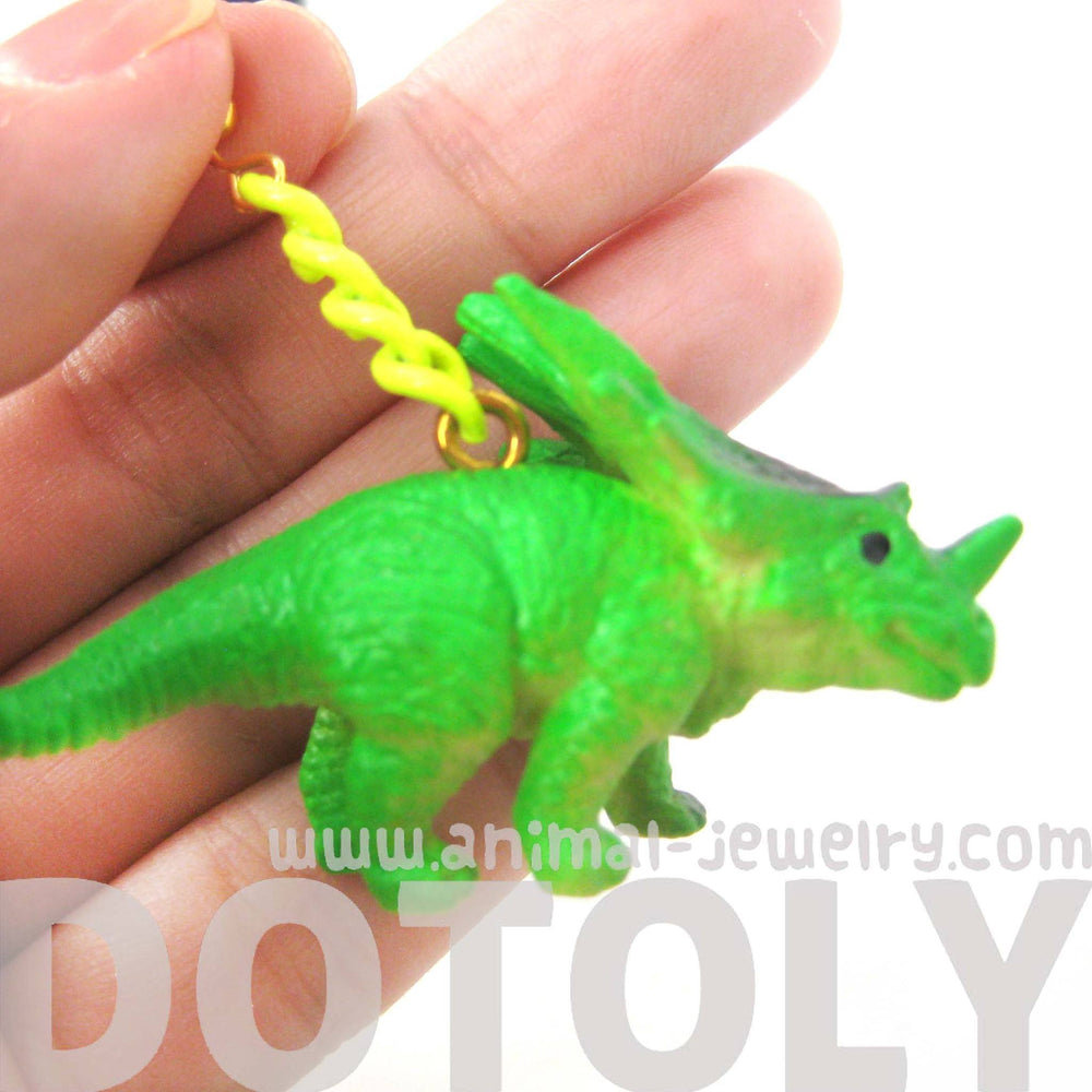Triceratops Dinosaur Animal Figurine Shaped Dangle Earrings in Green | DOTOLY