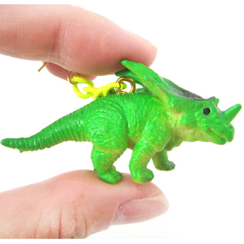 Triceratops Dinosaur Animal Figurine Shaped Dangle Earrings in Green | DOTOLY