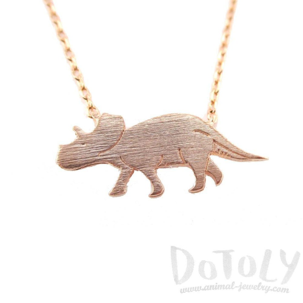 Triceratops Dinosaur Silhouette Jurassic World Themed Charm Necklace in Rose Gold | DOTOLY