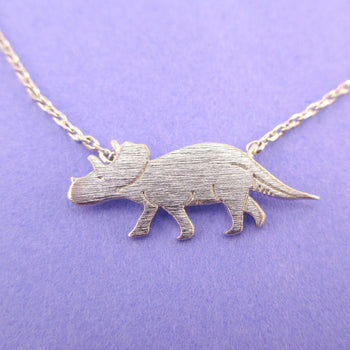 Triceratops Dinosaur Silhouette Jurassic World Themed Charm Necklace in Silver | DOTOLY