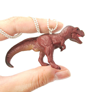 Tyrannosaurus Rex Dinosaur Shaped Figurine Pendant Necklace in Brown | Animal Jewelry | DOTOLY