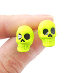 Unisex Skull Shaped Skeleton Themed Rocker Chic Stud Earrings in Neon Yellow | DOTOLY