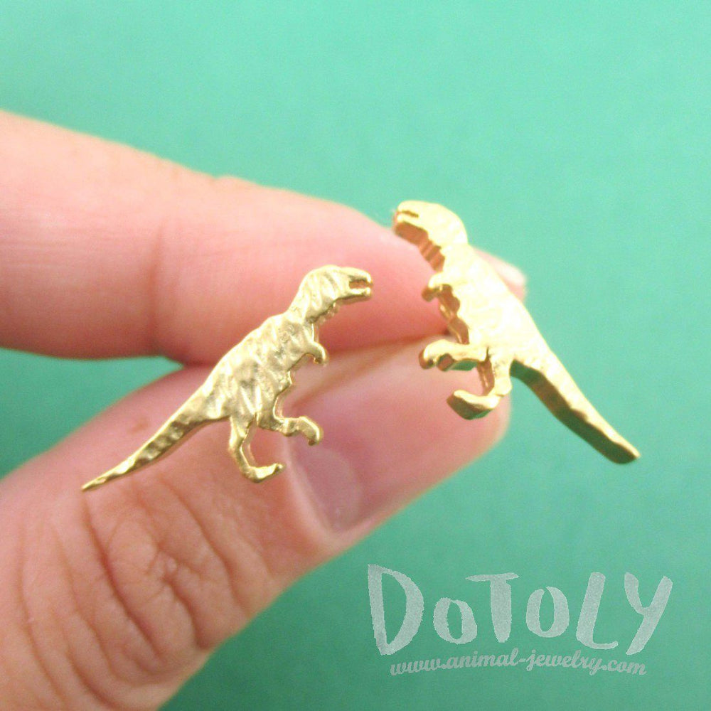 Velociraptor Dinosaur Silhouette Shaped Stud Earrings in Gold | DOTOLY