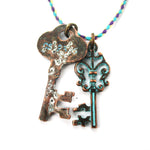 Vintage Skeleton Key Charm Necklace in Brass with Turquoise Details | DOTOLY | DOTOLY